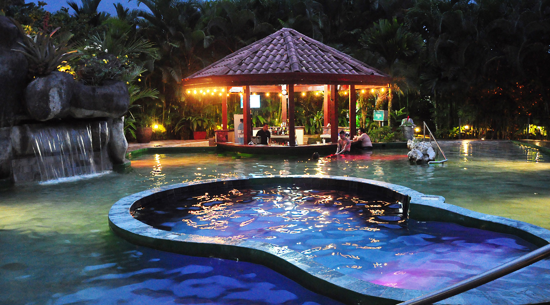Pangea hot springs pool at night